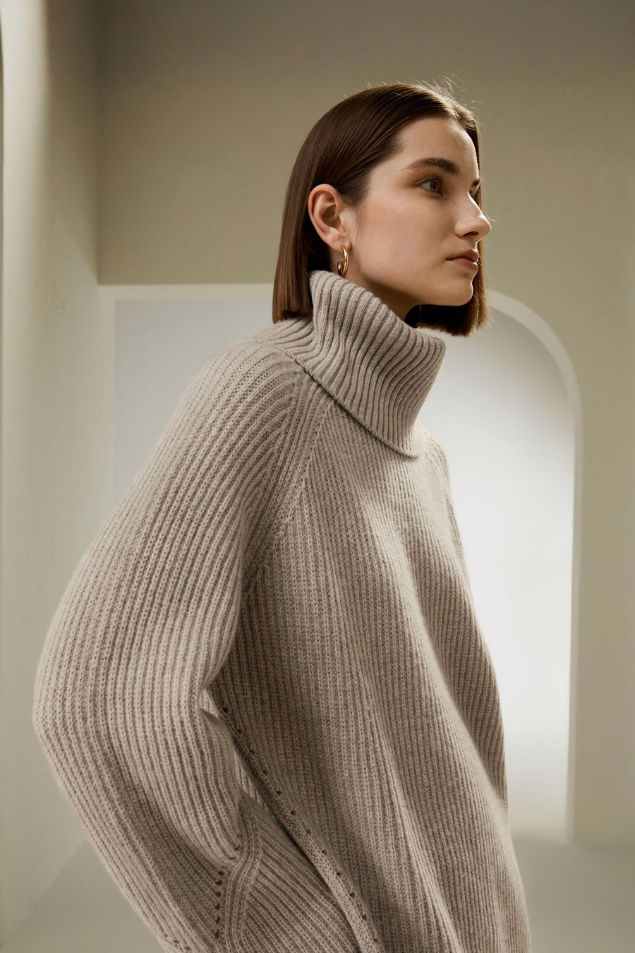 Oversized Merinowolle Pullover mit Schlitzärmeln